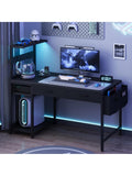 Gaming Schreibtisch 100 cm mit LED Beleuchtung Steckdosen zwei Schubladen Seitentasche und Ablagefach in Schwarz